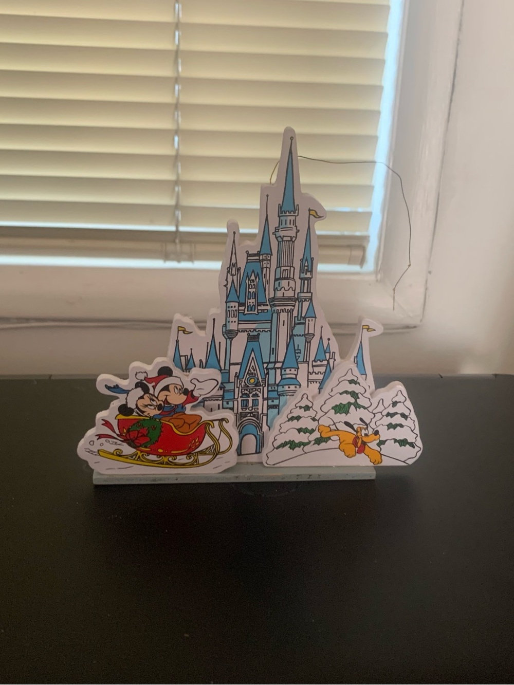 Blue Castle Holiday Table Accent with Festive Cartoon Ski Scenes